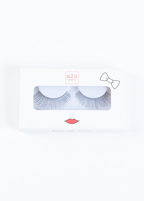 a pair of natural volume style false eyelashes for a subtle, sweet, feminine look 