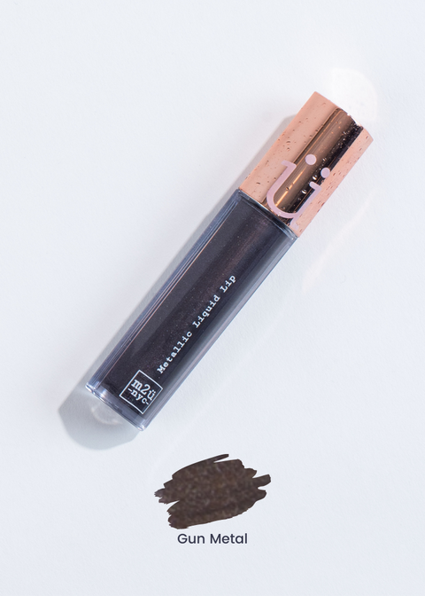metallic liquid lipstick in shade "Gun Metal" (metallic black metal)