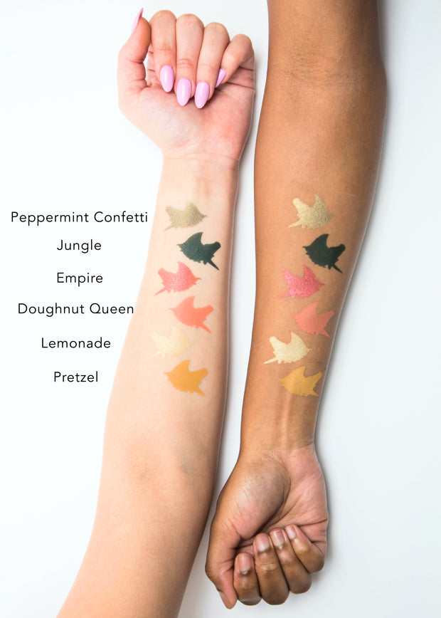 unicorn-shaped color swatches of the six shade eyeshadow palette-concrete jungle, from light to dark