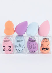 eight makeup blending sponges in four colors lining up