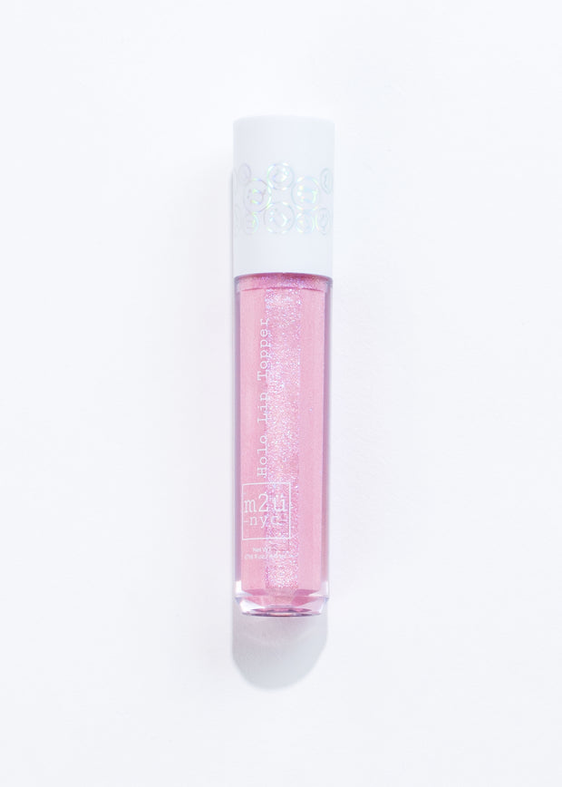 a bottle of pink iridescent holographic lip gloss with white background