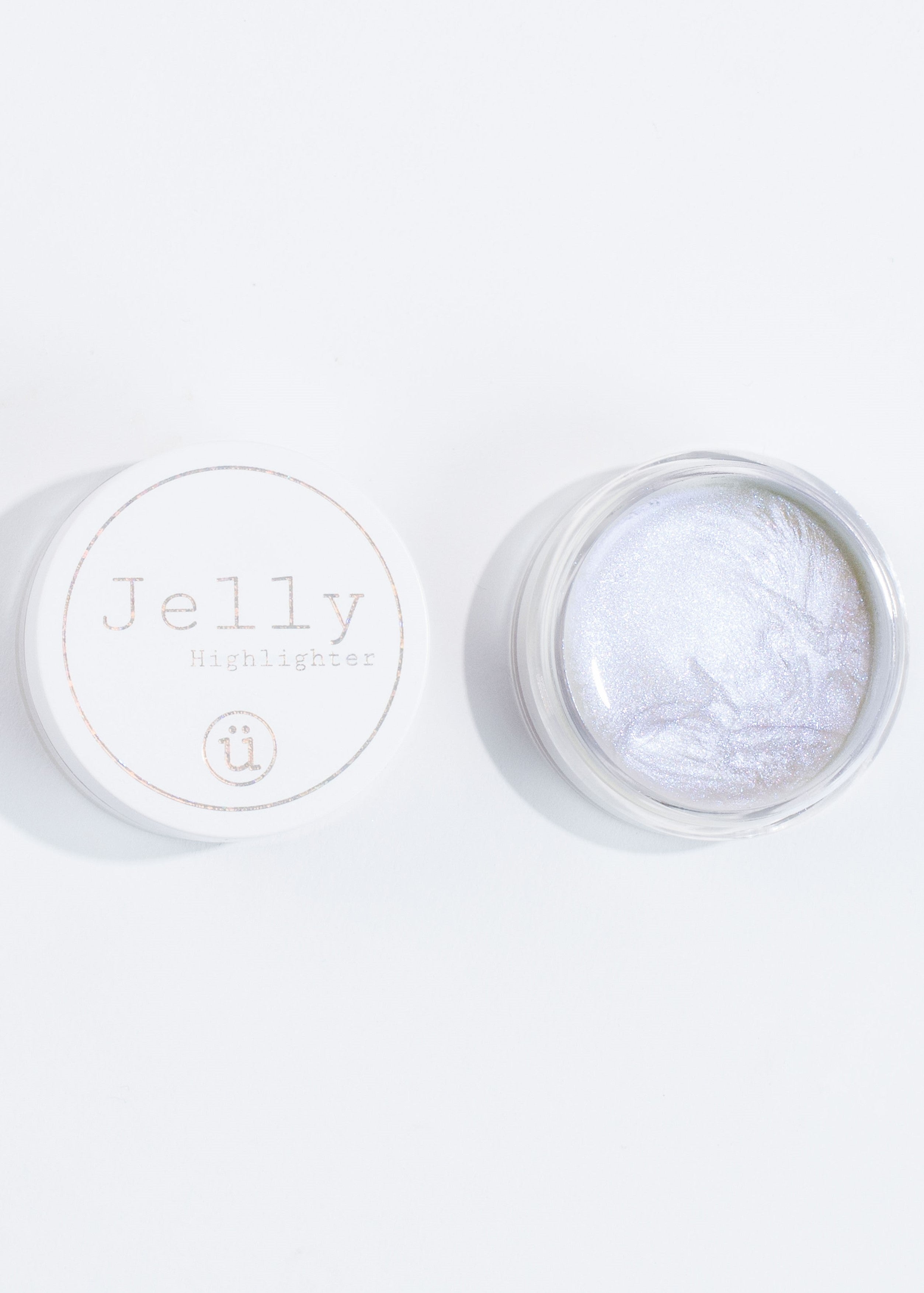 an open jar of the iridescent jelly highlighter, vegan and cruelty free