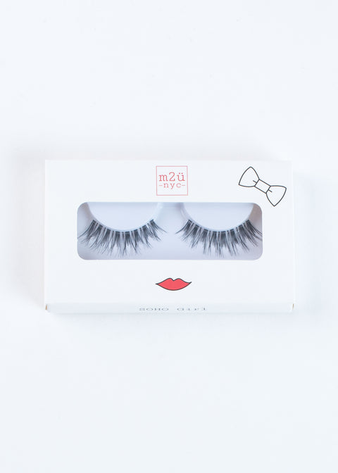 a pair of full-volume stacked style false eyelashes that gives a retro look