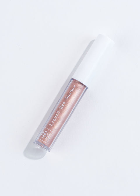 a bottle of liquid eyeshadow in shade victory - rosy pink