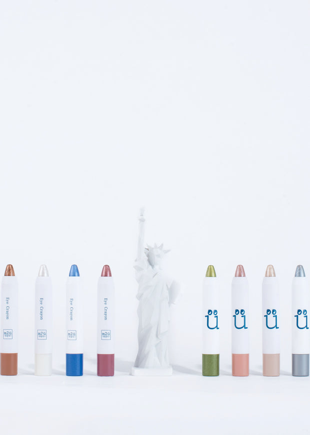 full collection of eye crayons aligning with statue of liberty 