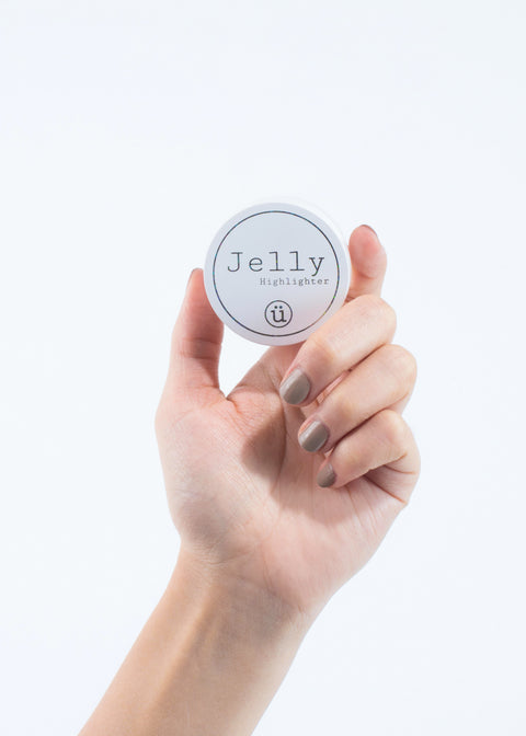 hand holding a jelly highlighter in a jar, vegan and cruelty free